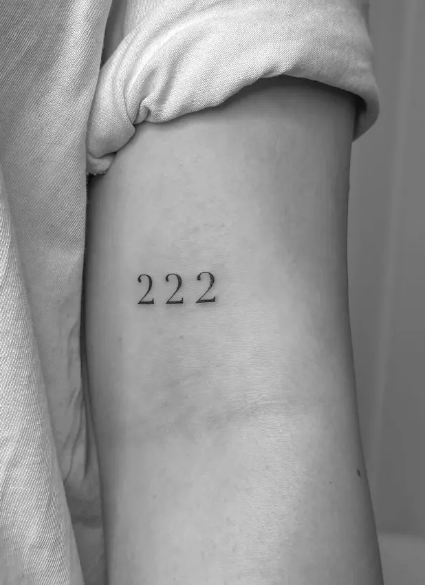 222 numerical tattoo with minimalist styling by Chelsea.Q